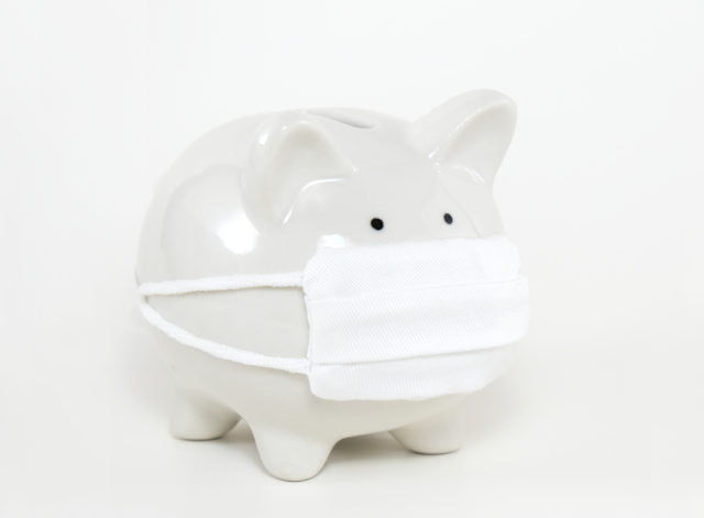 White,Ceramic,Piggy,Bank,Wearing,Surgical,Mask,On,White,Background