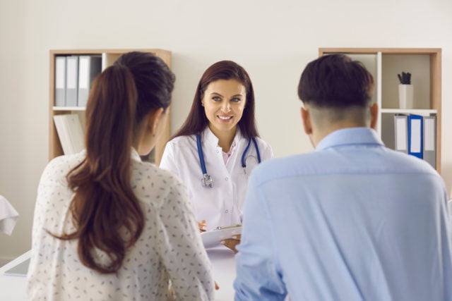 Young couple in doctor's office