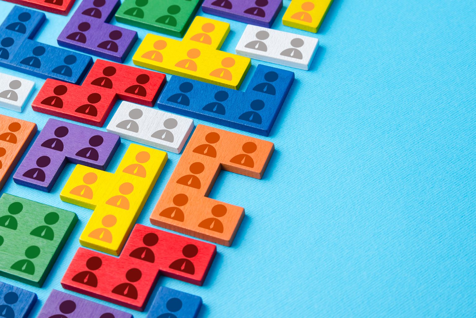 Worker icons on different colored blocks